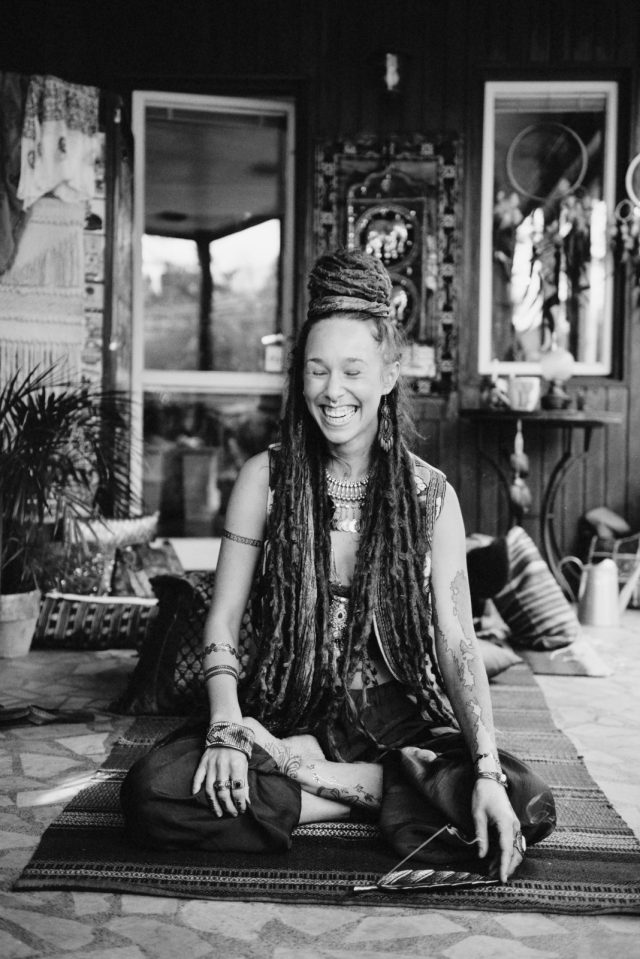 a woman sitting on the floor