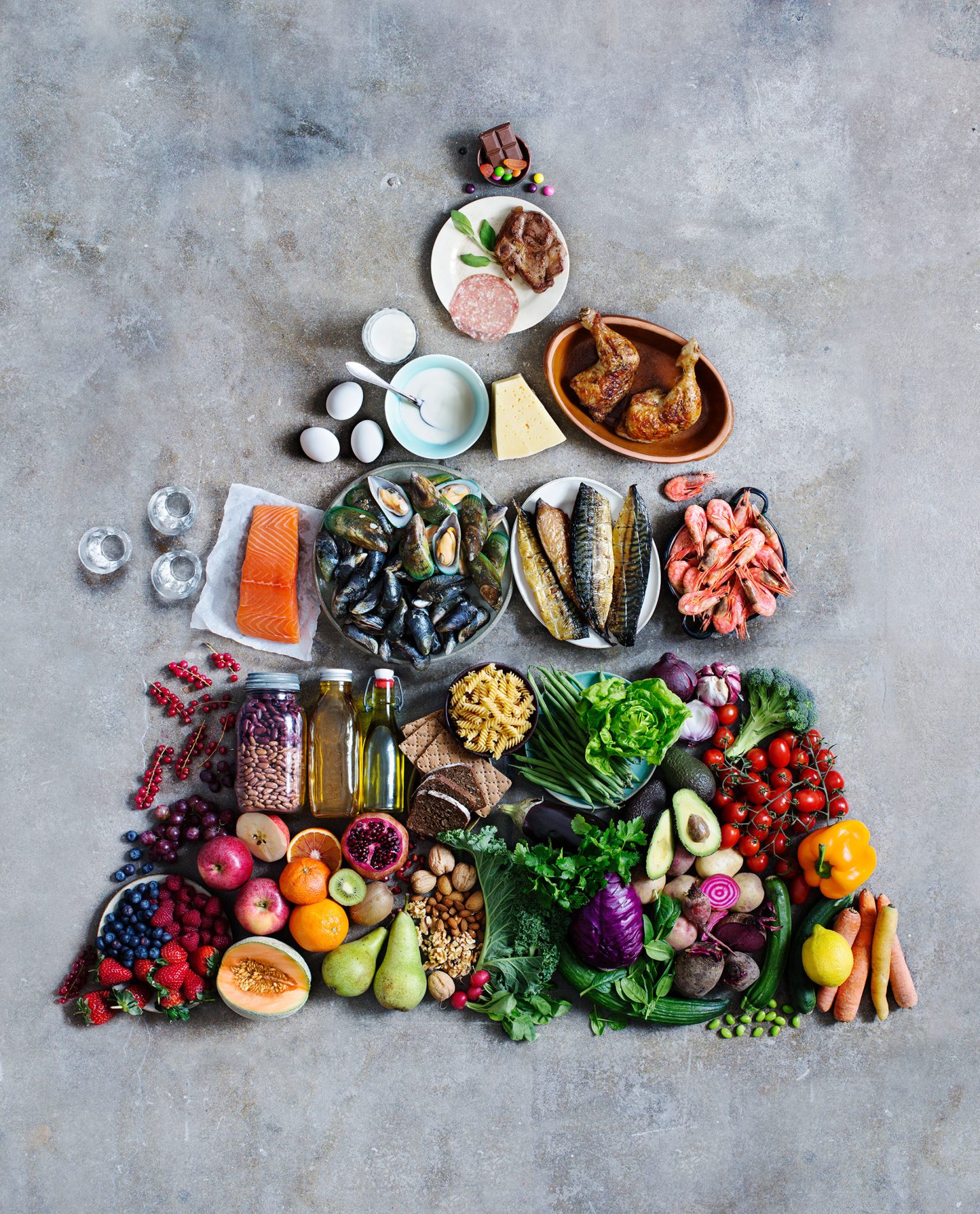 a pyramid of food arranged in a shape of a tree