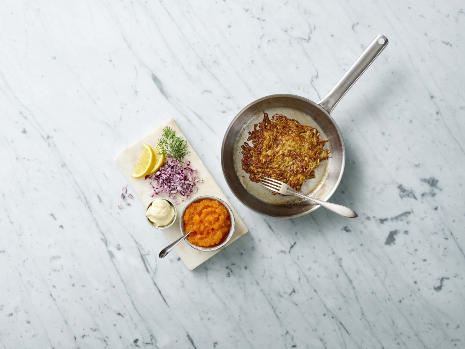 a pan with food in it and a fork on it
