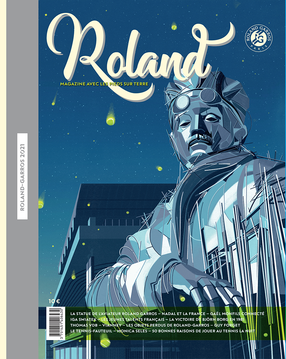 a magazine cover with a statue