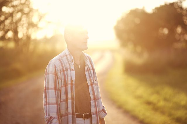 a man standing on a path