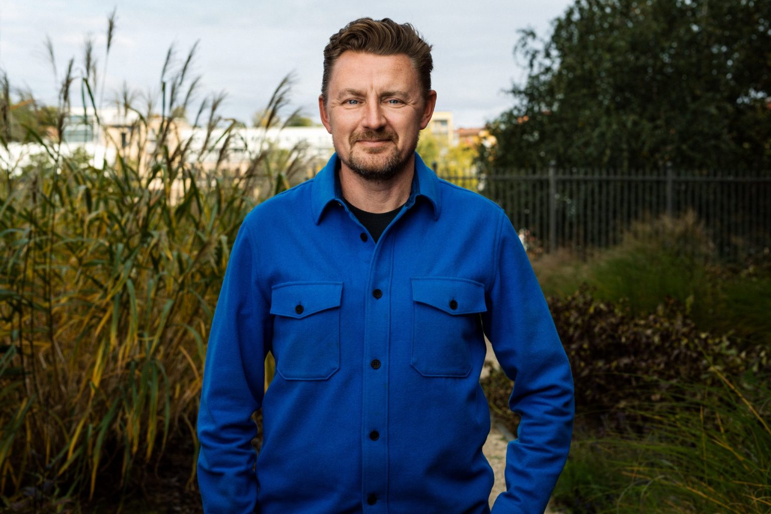 a man in a blue shirt