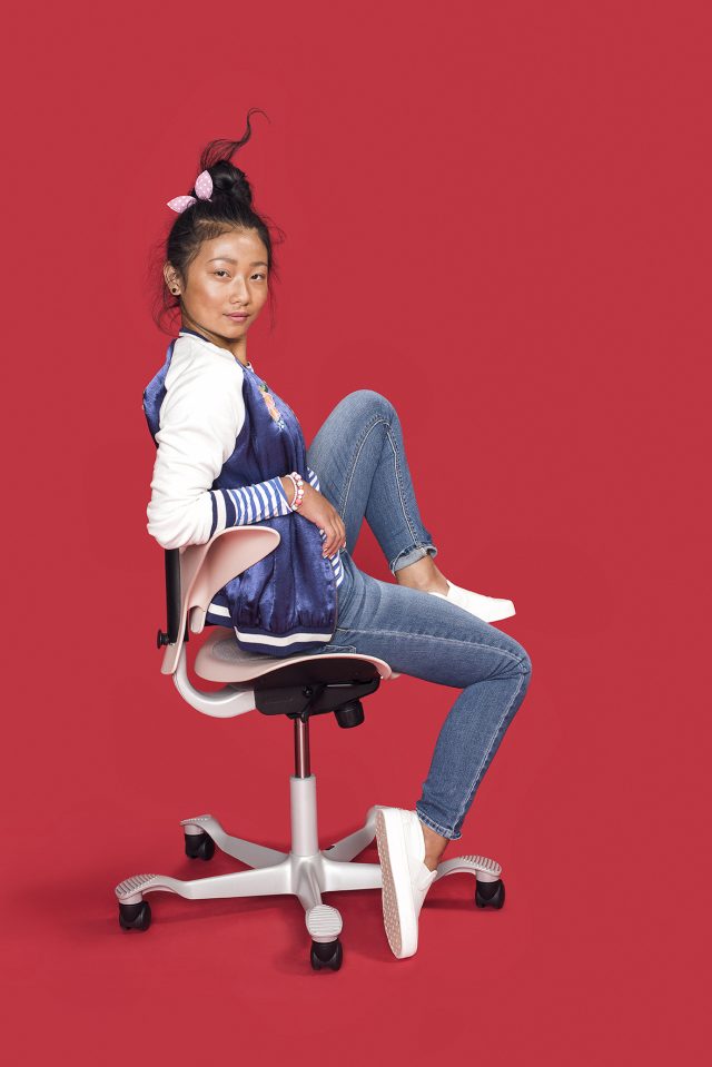 a woman sitting on a chair