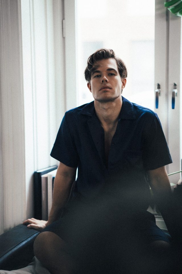 a man sitting on a bench