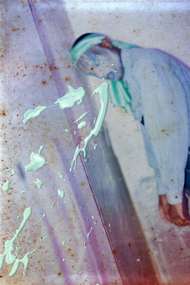 a man with a hat and a skateboard