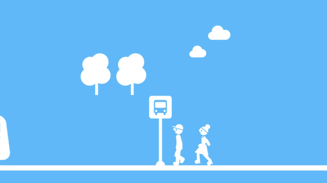 a man and woman walking on a sidewalk