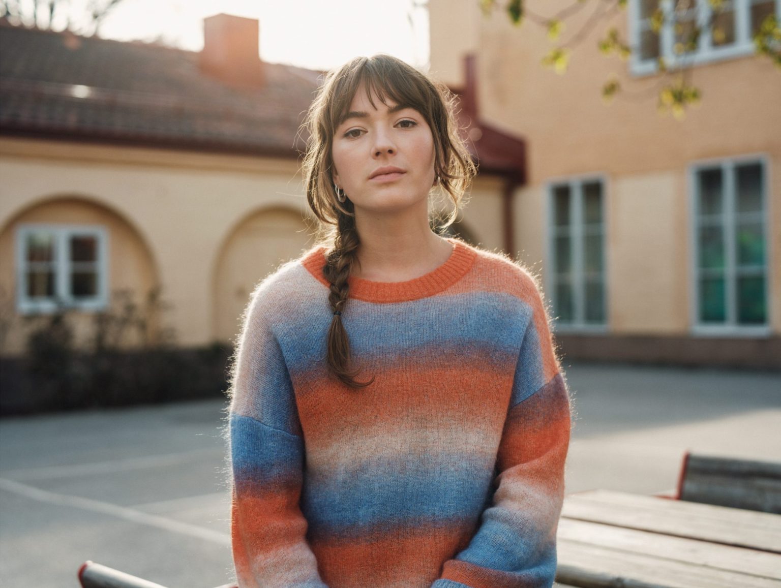 a woman in a sweater