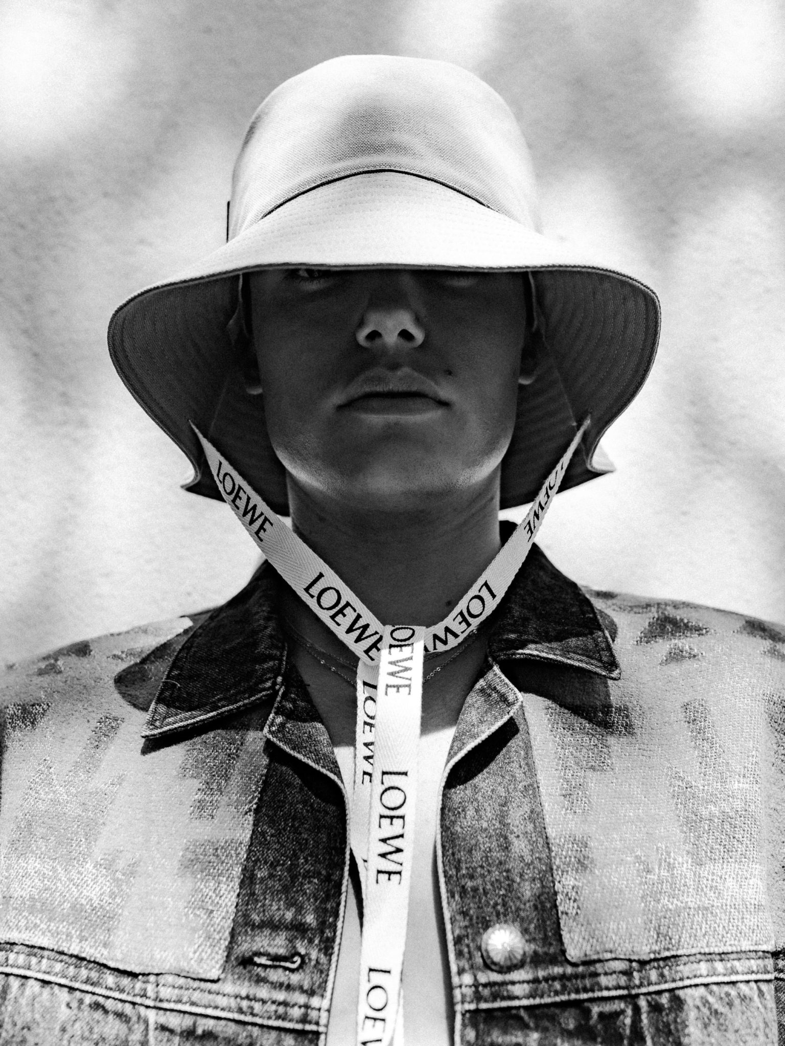 a man wearing a hat and a jacket