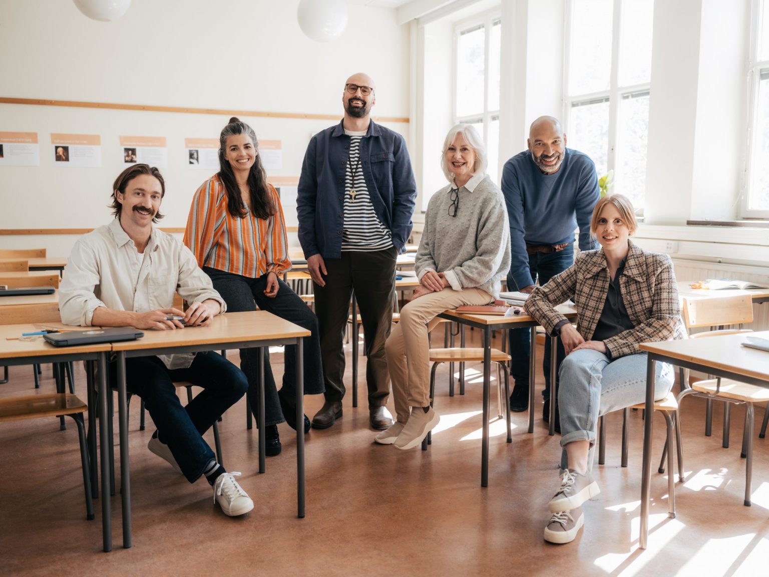a group of people posing for a photo