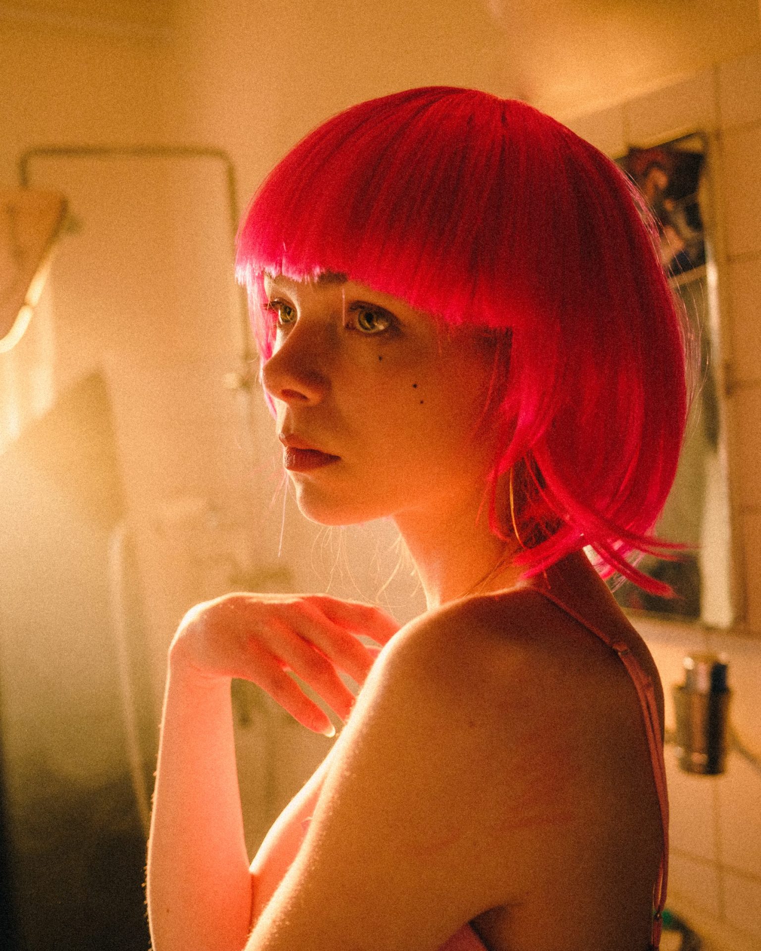 a woman with pink hair