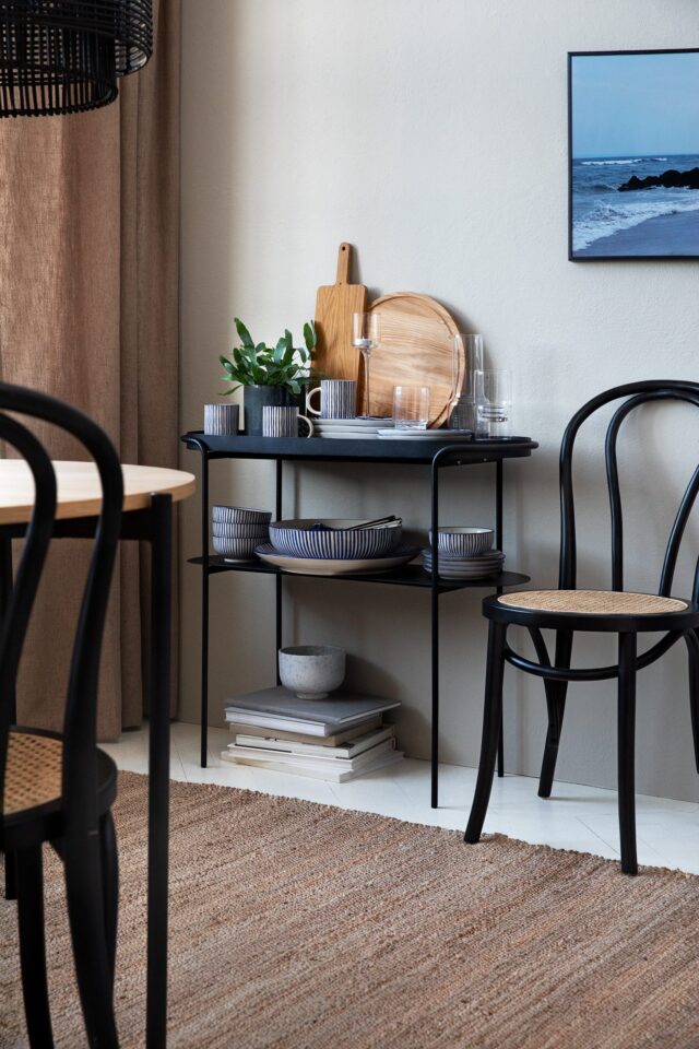 a table with plates and bowls on it