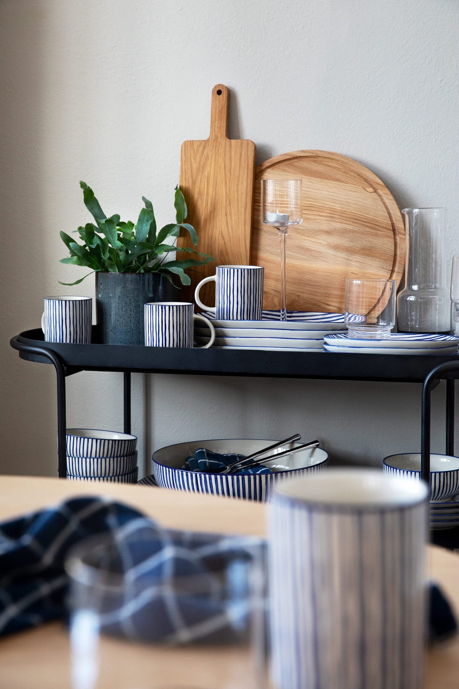 a shelf with plates and cups