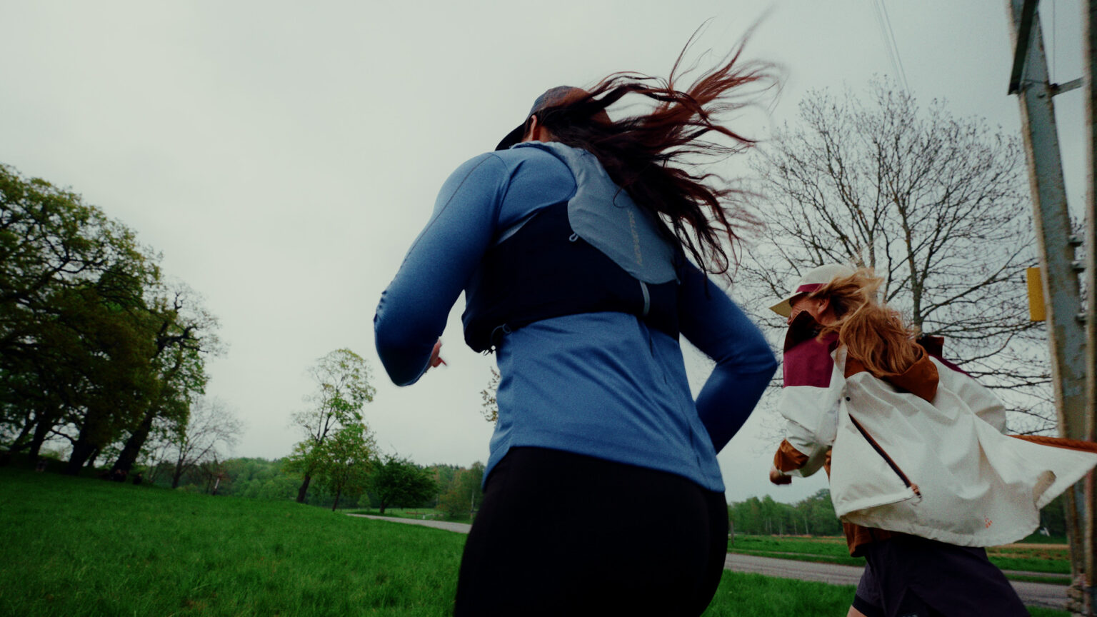a woman running in a field