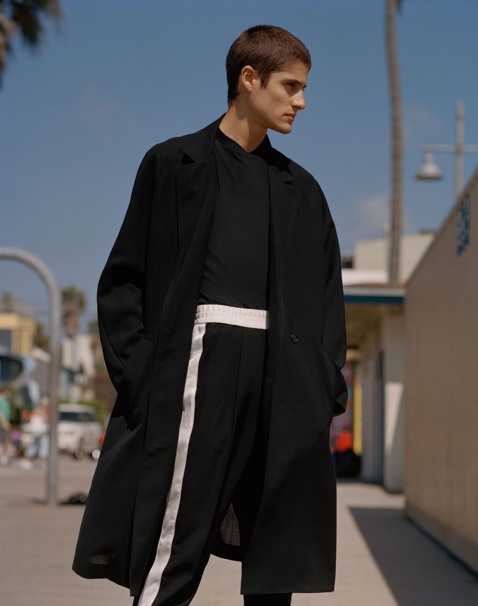 a man in a black coat