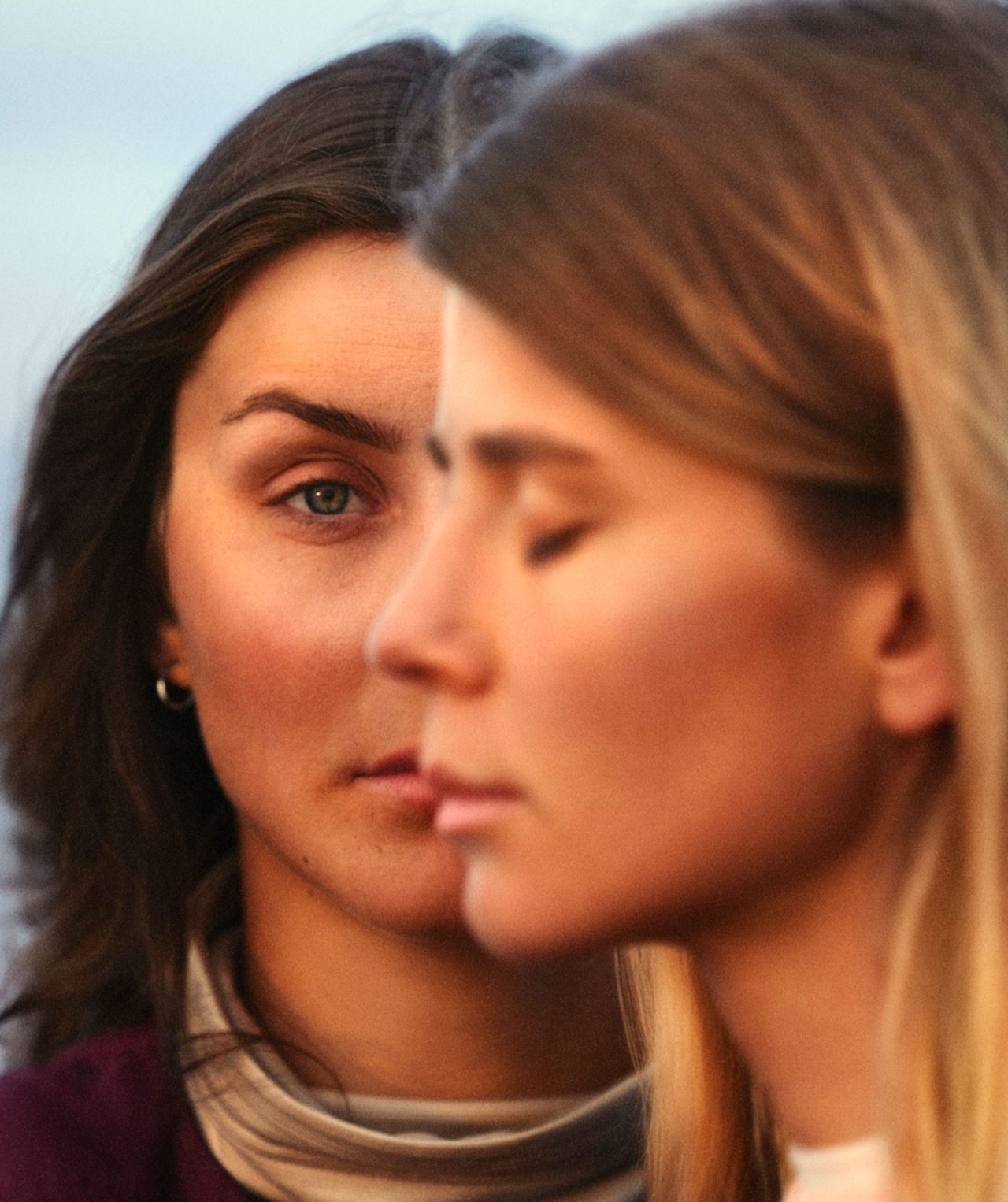 a close up of two women