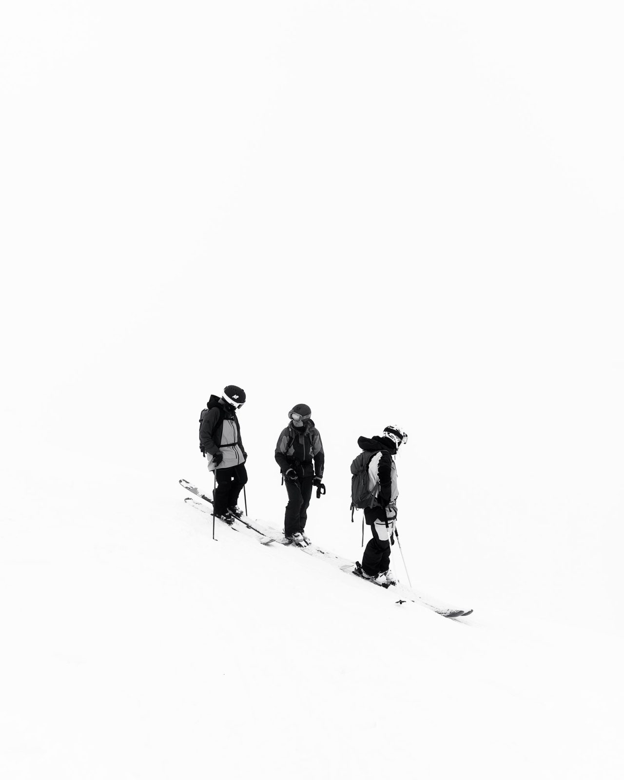a group of people skiing on a snowy mountain