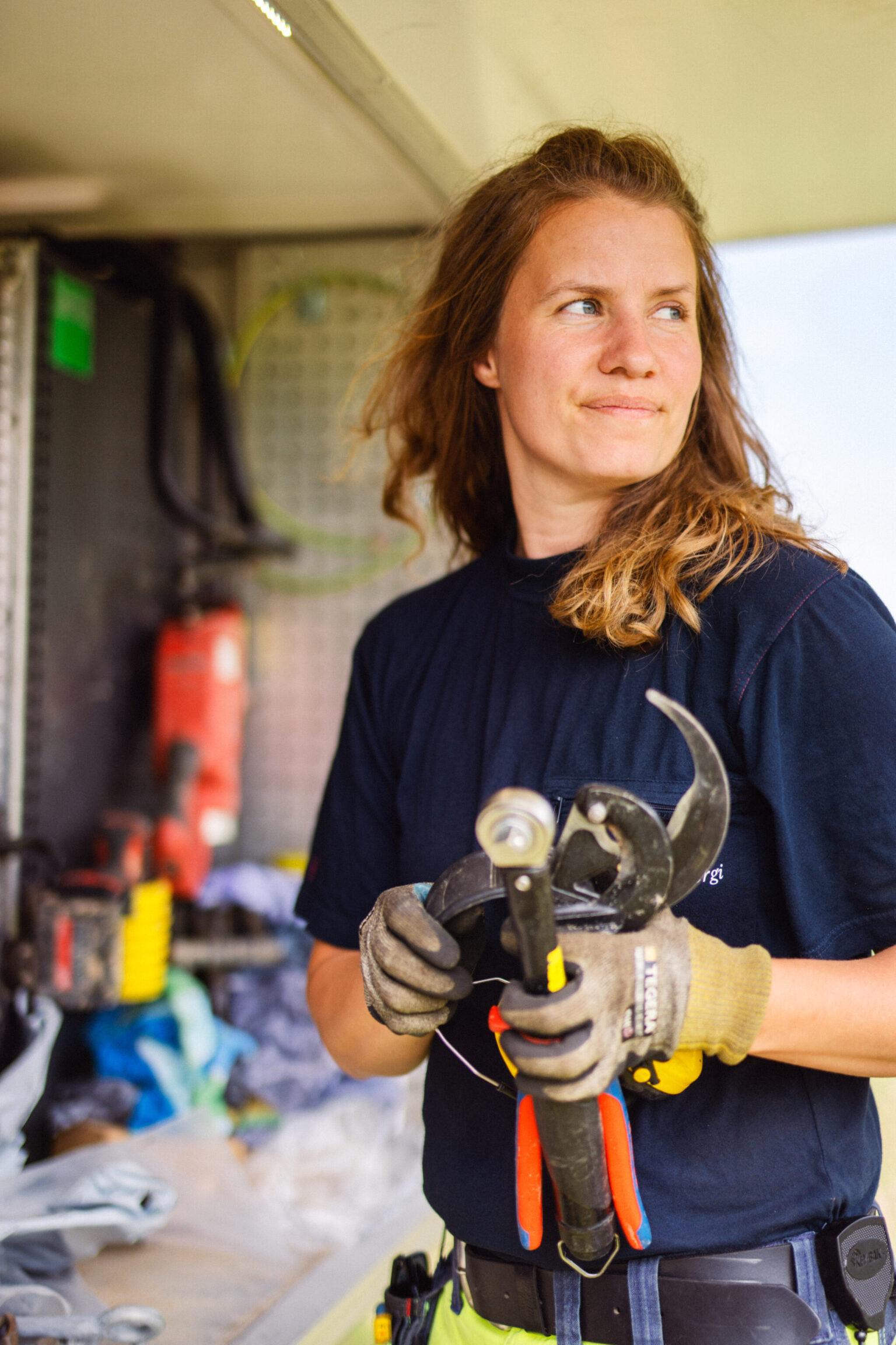 a woman holding a tool