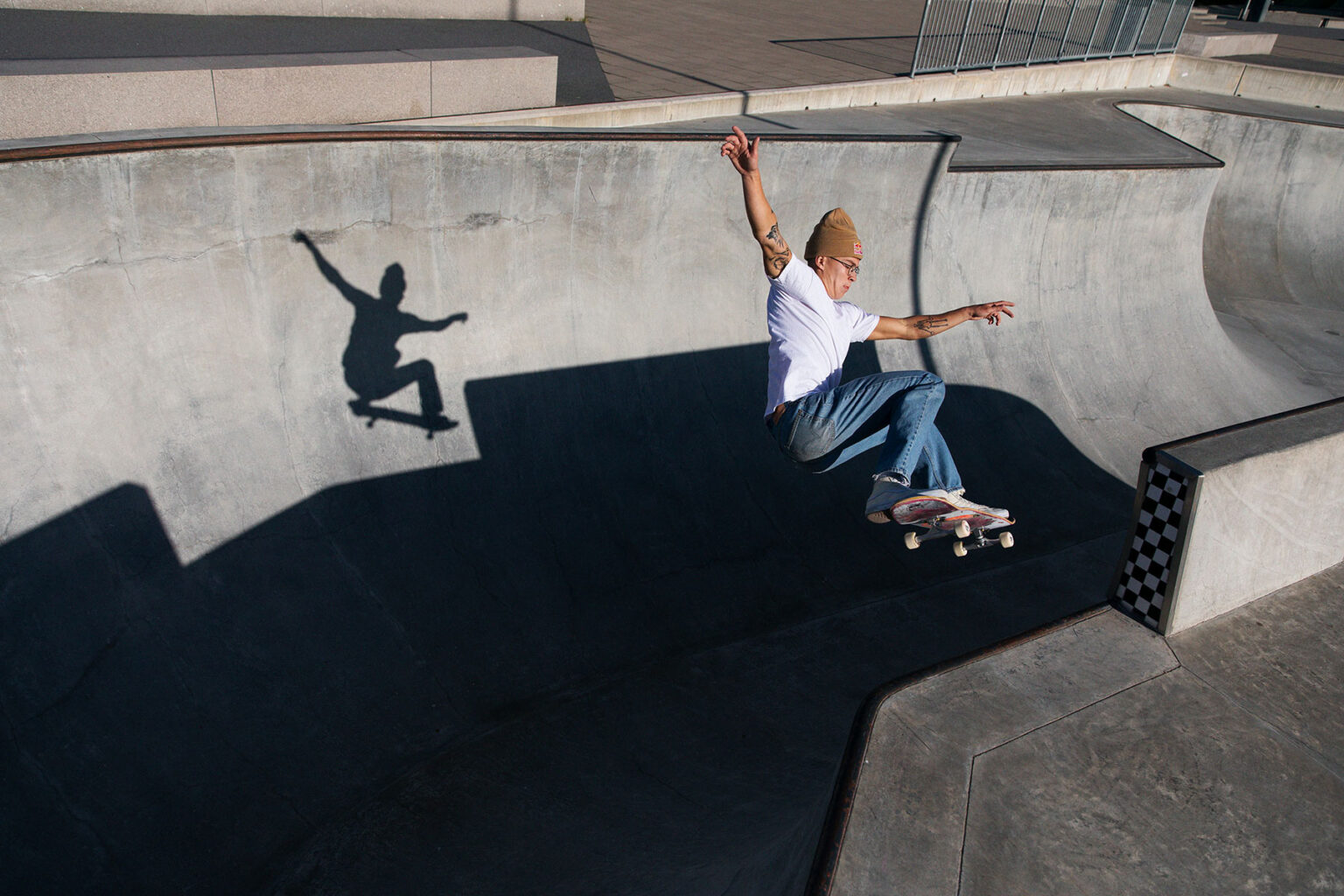a man jumping on a skateboard