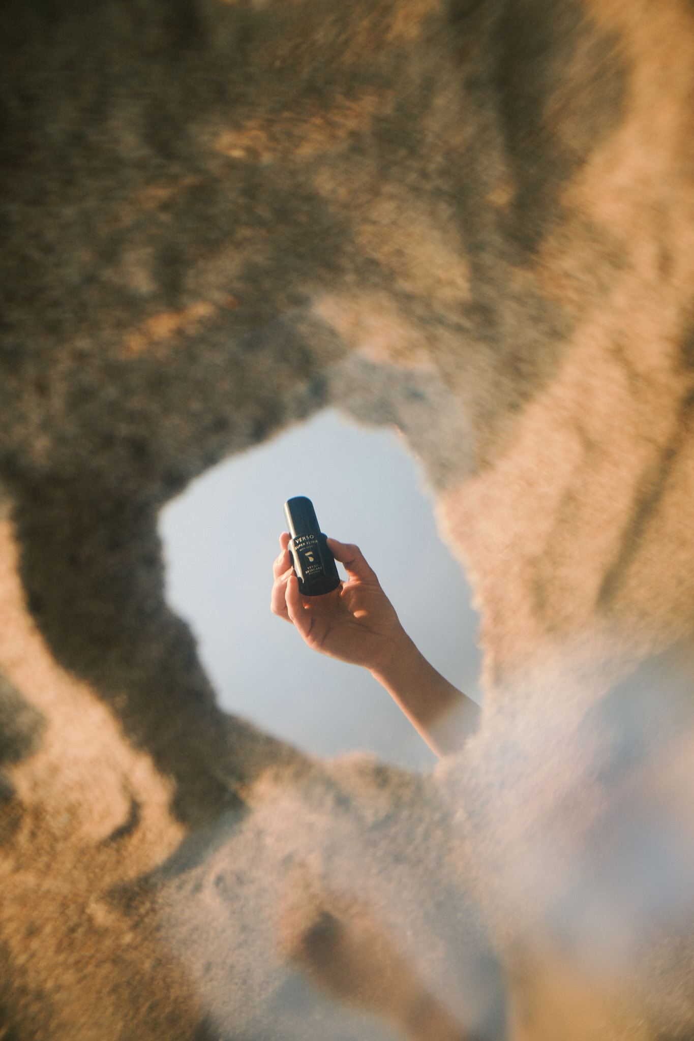 a hand holding a phone
