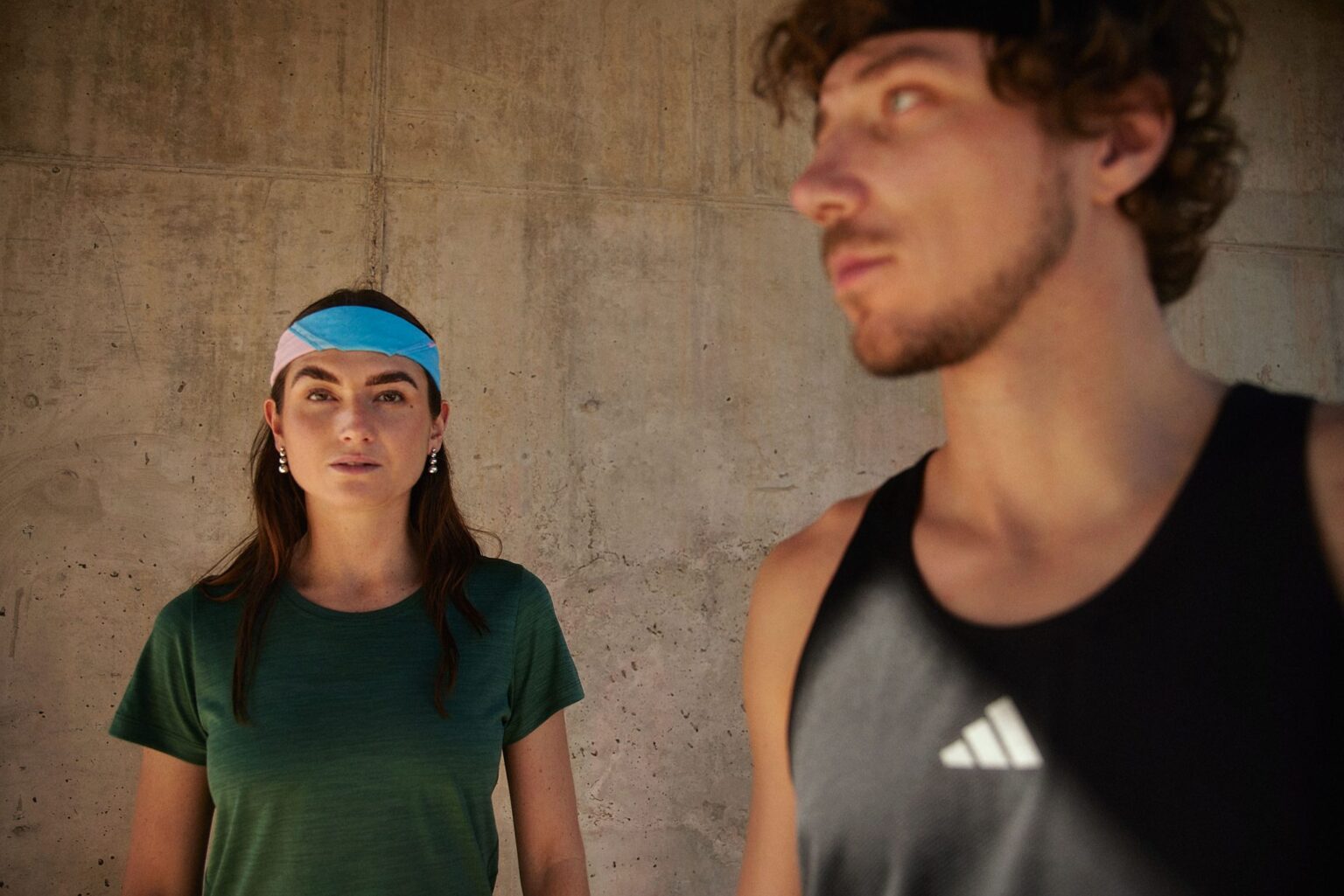 a man and woman looking at each other