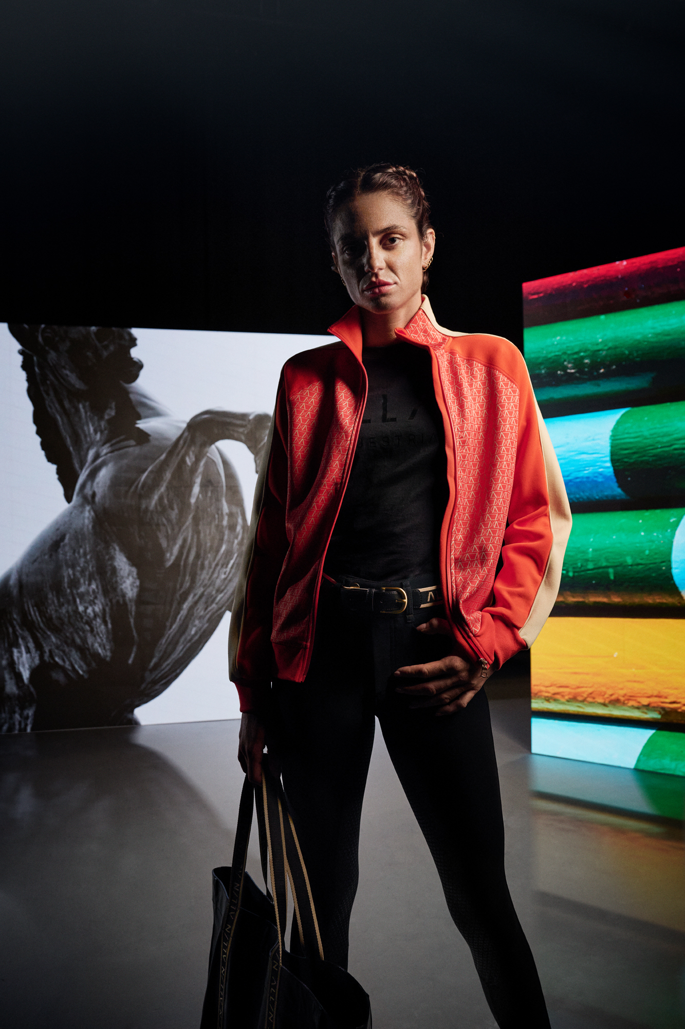 a woman in a red jacket