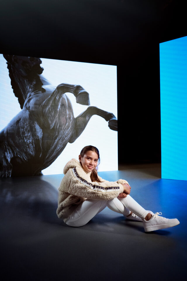 a woman sitting on the floor