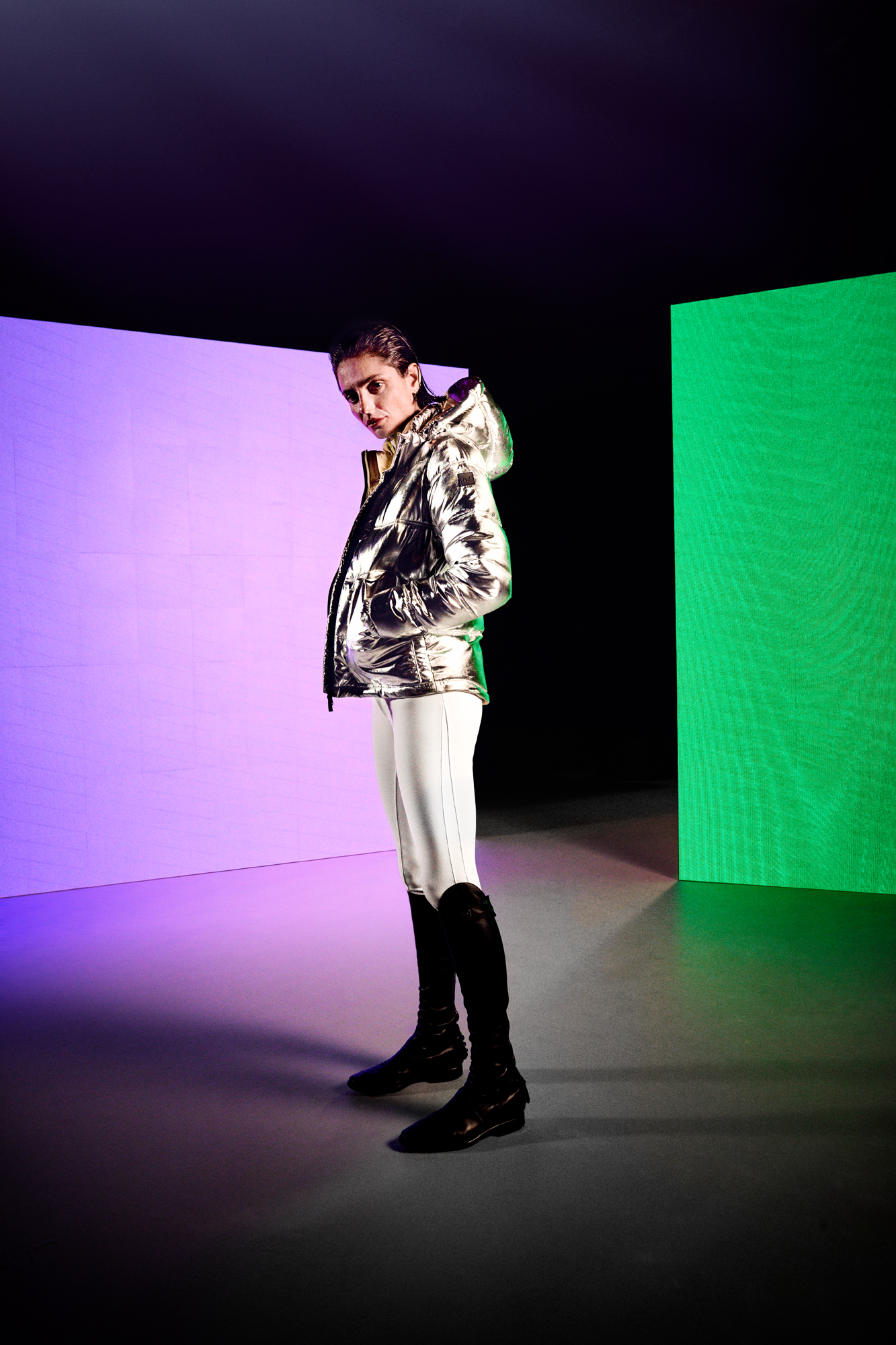 a woman in a shiny jacket