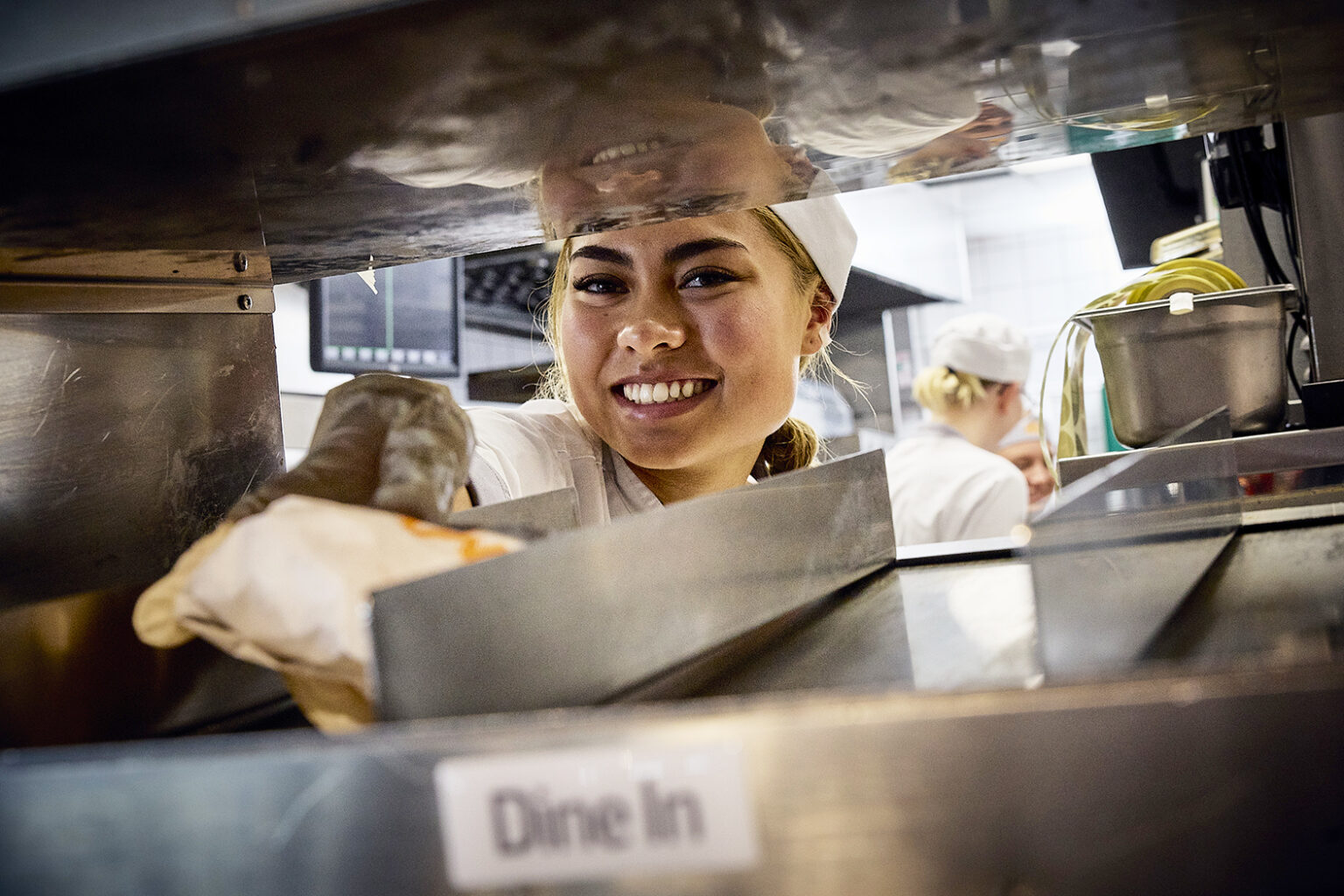 a woman smiling at the camera