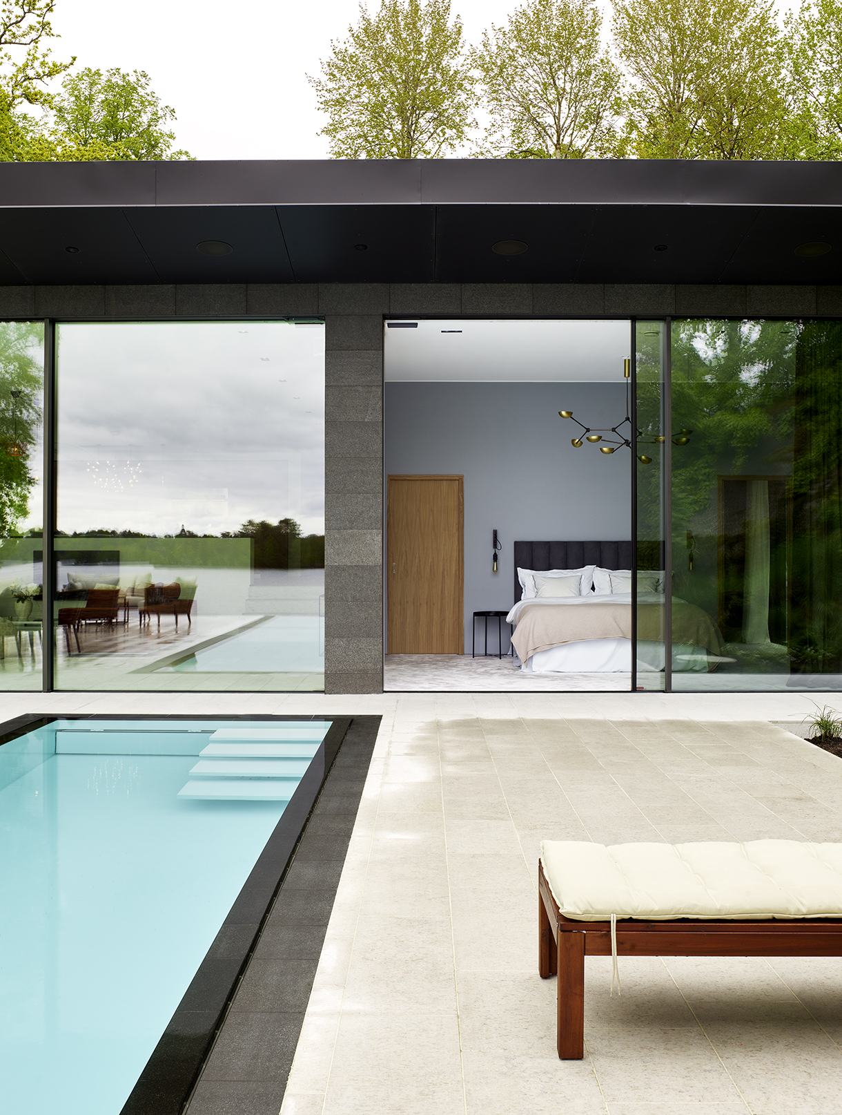 a pool and a bed in a house