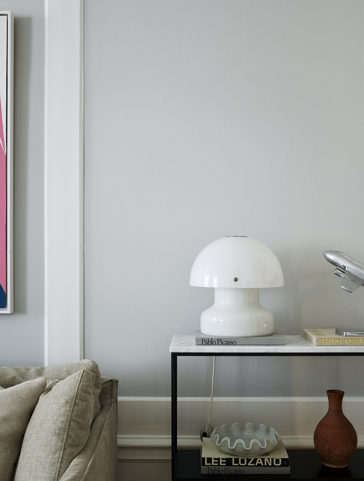 a white lamp on a table