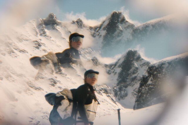 a couple of people in snow gear