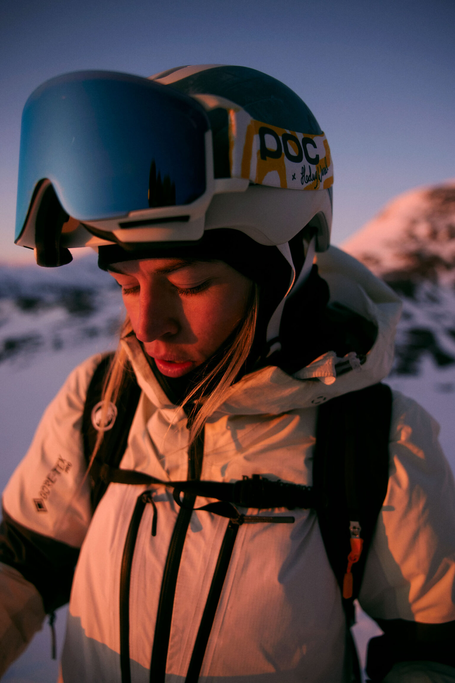 a person wearing a helmet and goggles