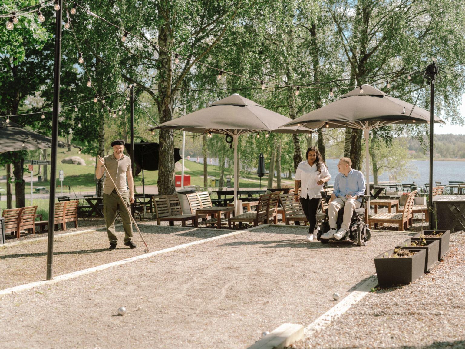 a group of people playing bocce ball