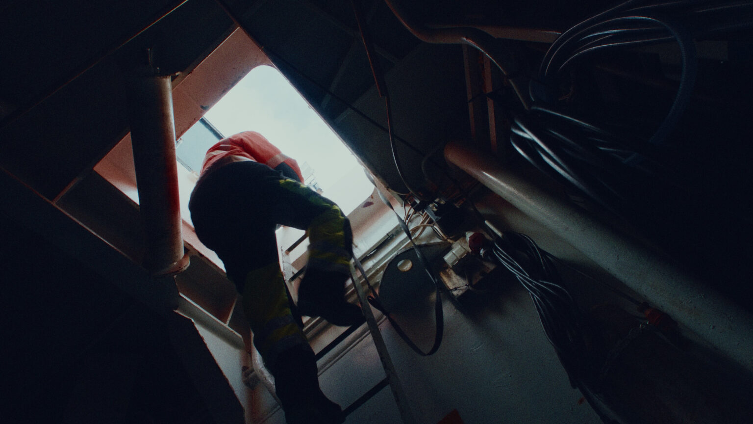 a person climbing up a ladder