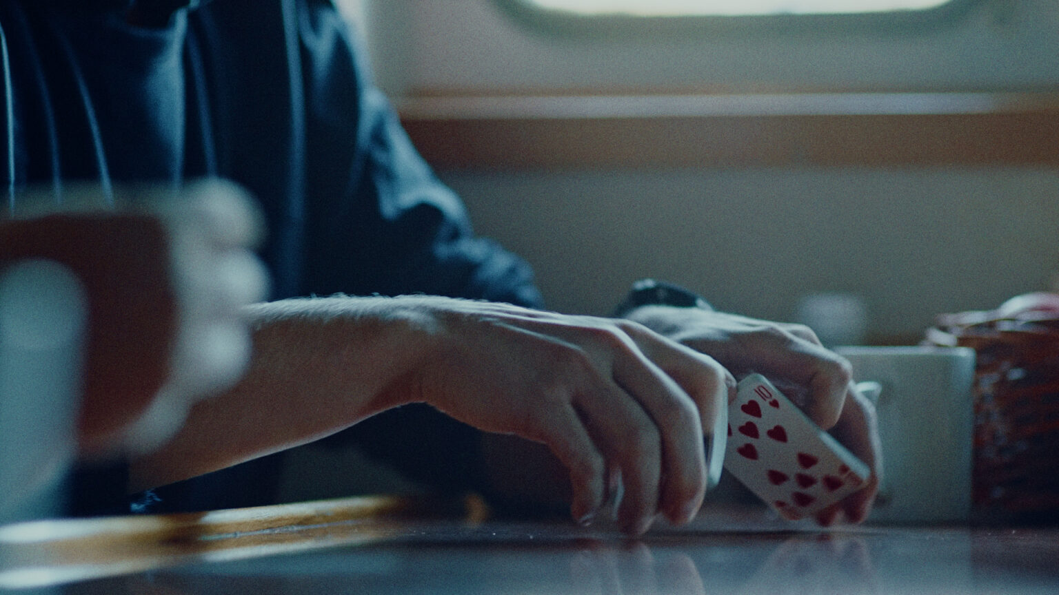 a person playing cards