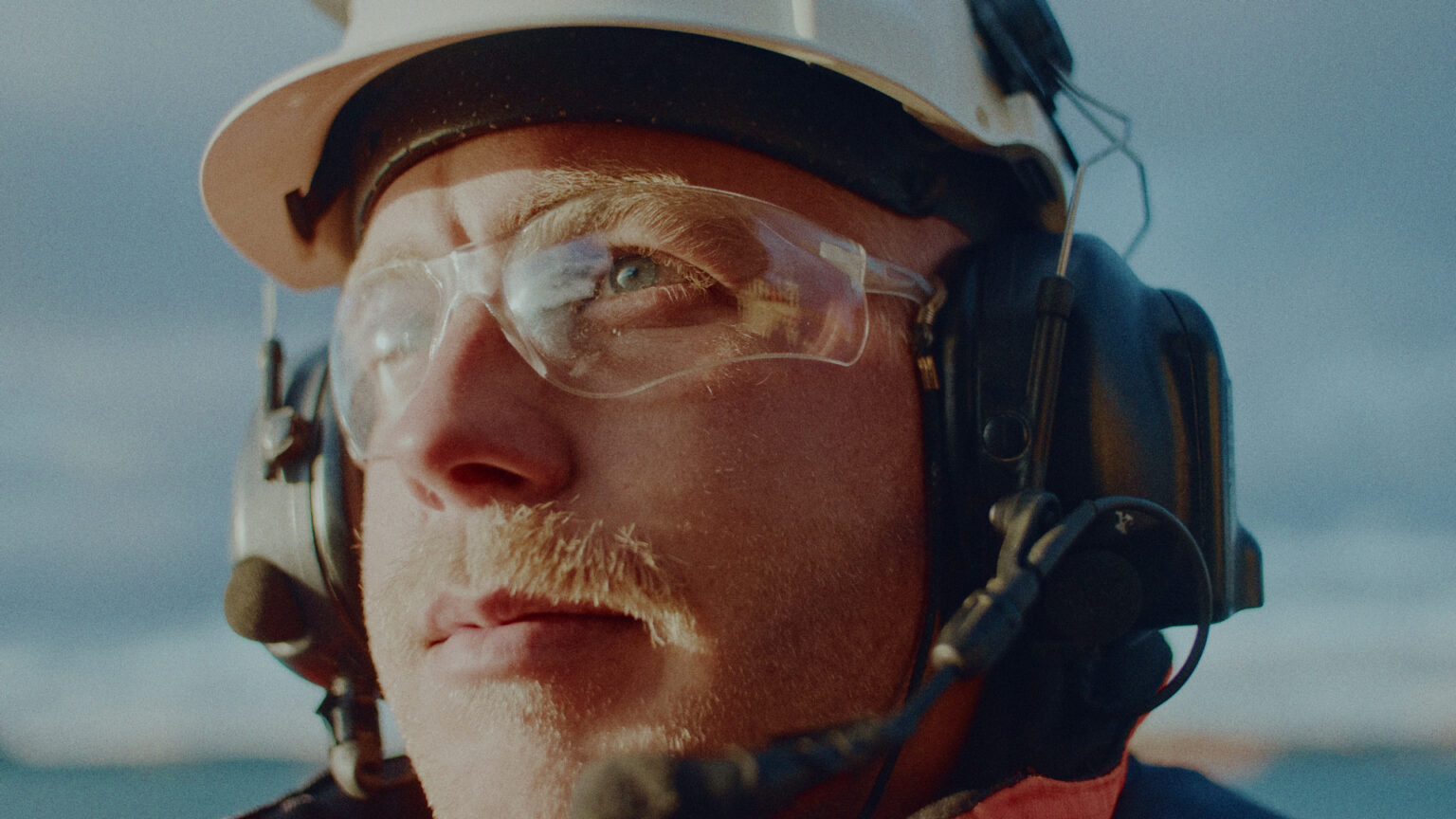 a man wearing a helmet and goggles