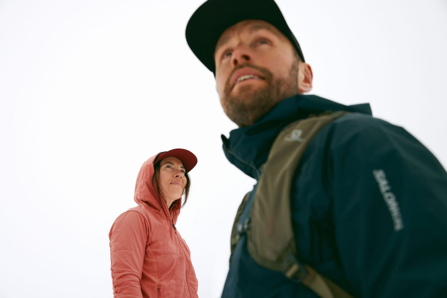 a man and woman looking up