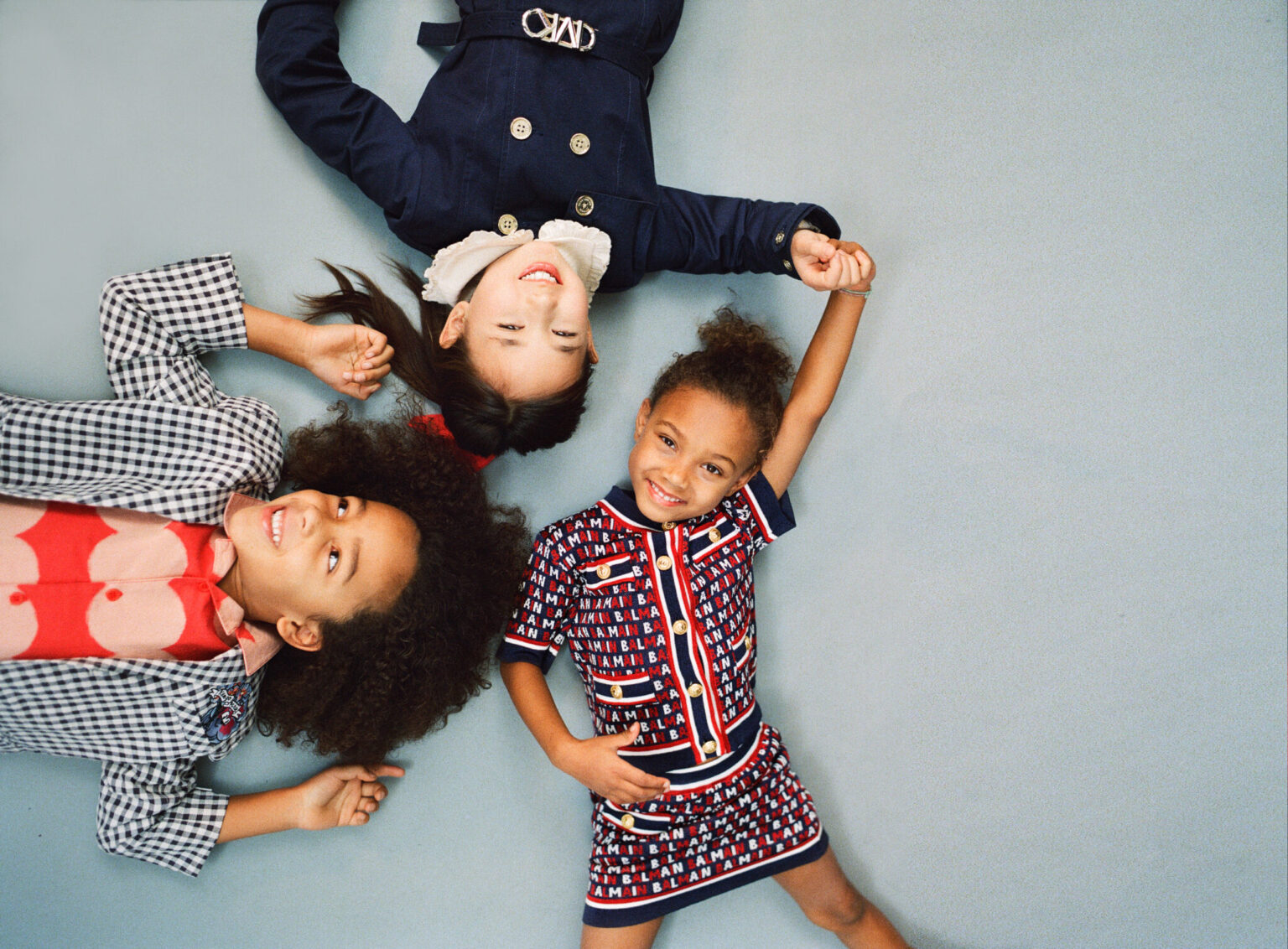 a group of children lying on the floor