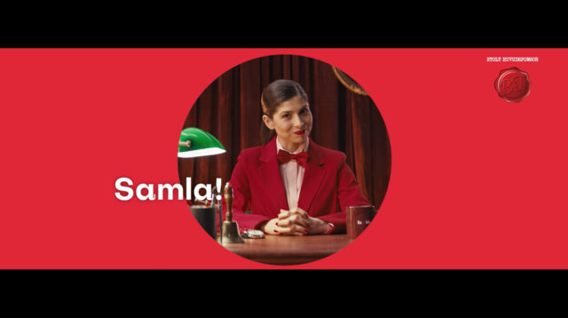 a woman in a red suit