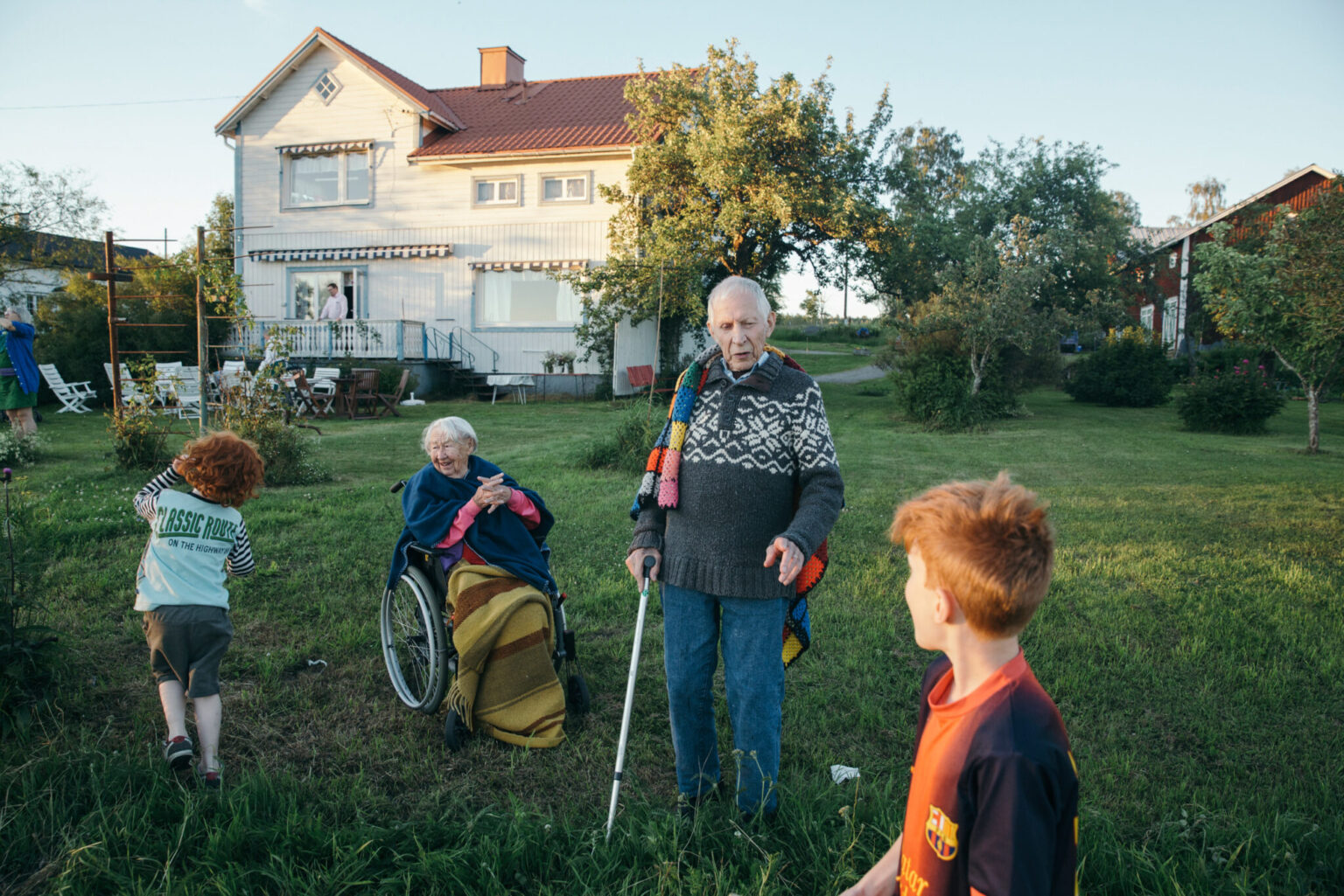 a group of people in a yard