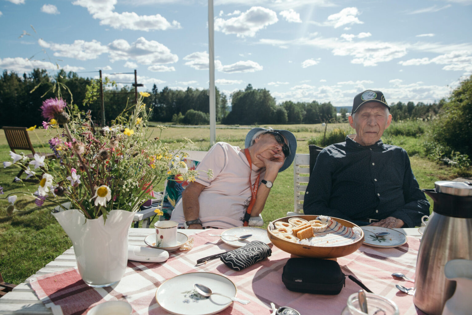 two men sitting at a table