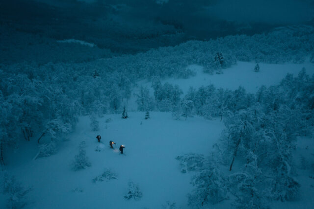 people walking in the snow