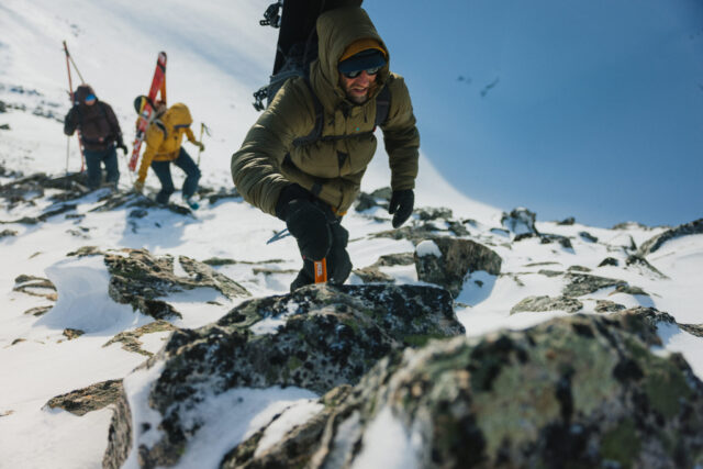 a man climbing a mountain