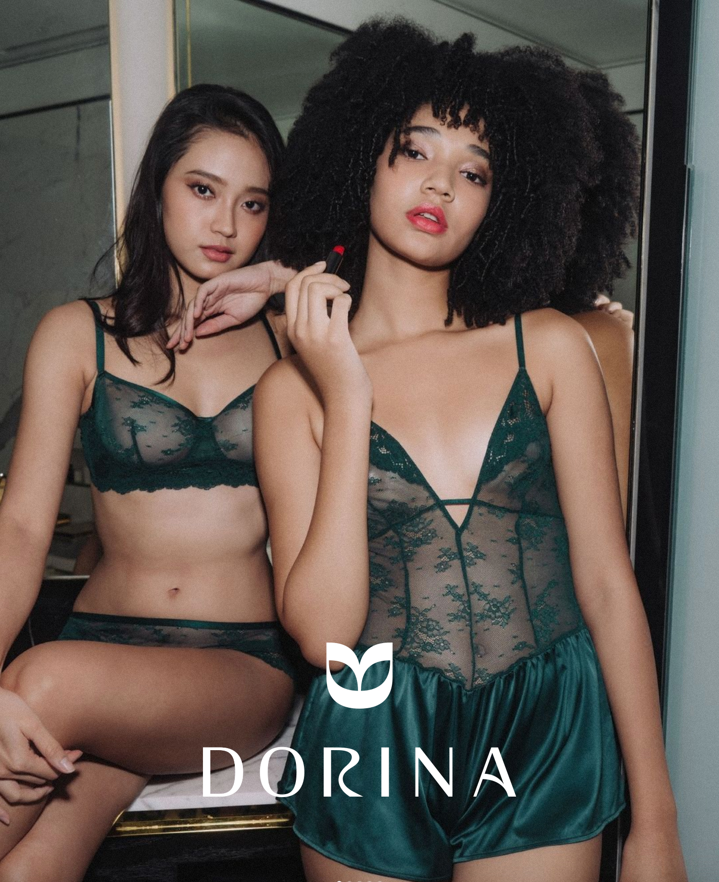 two women in lingerie posing for a picture