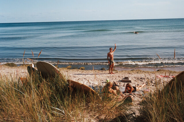 a group of people on a beach
