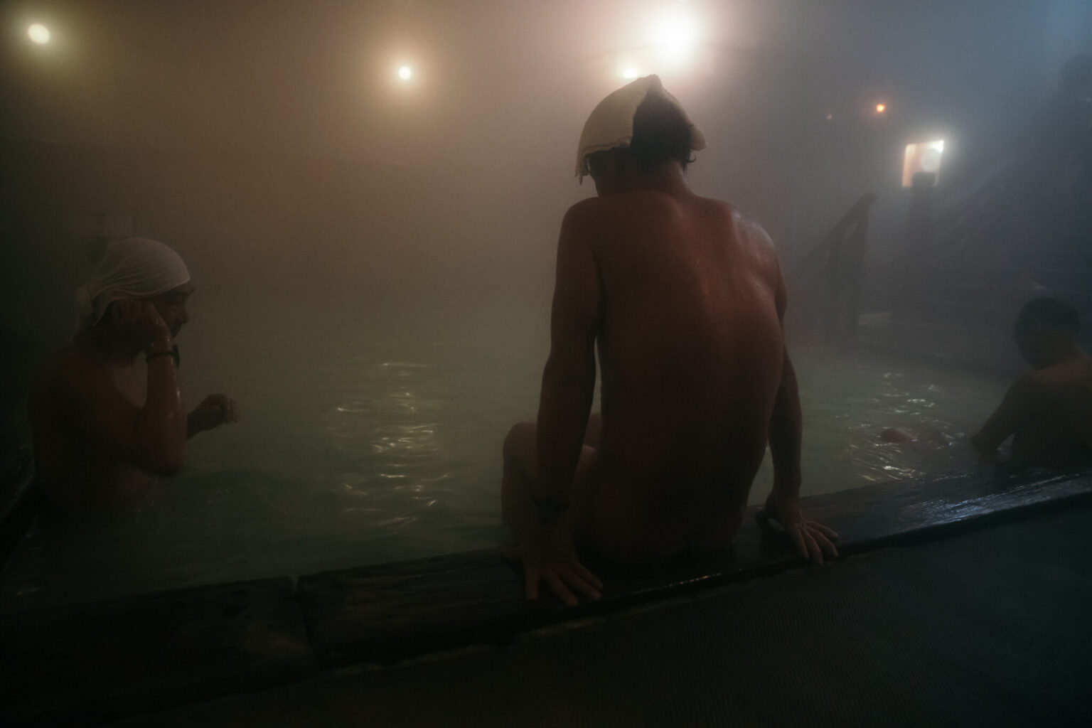 a group of people in a pool