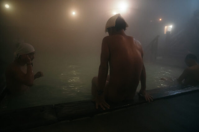 a group of people in a pool