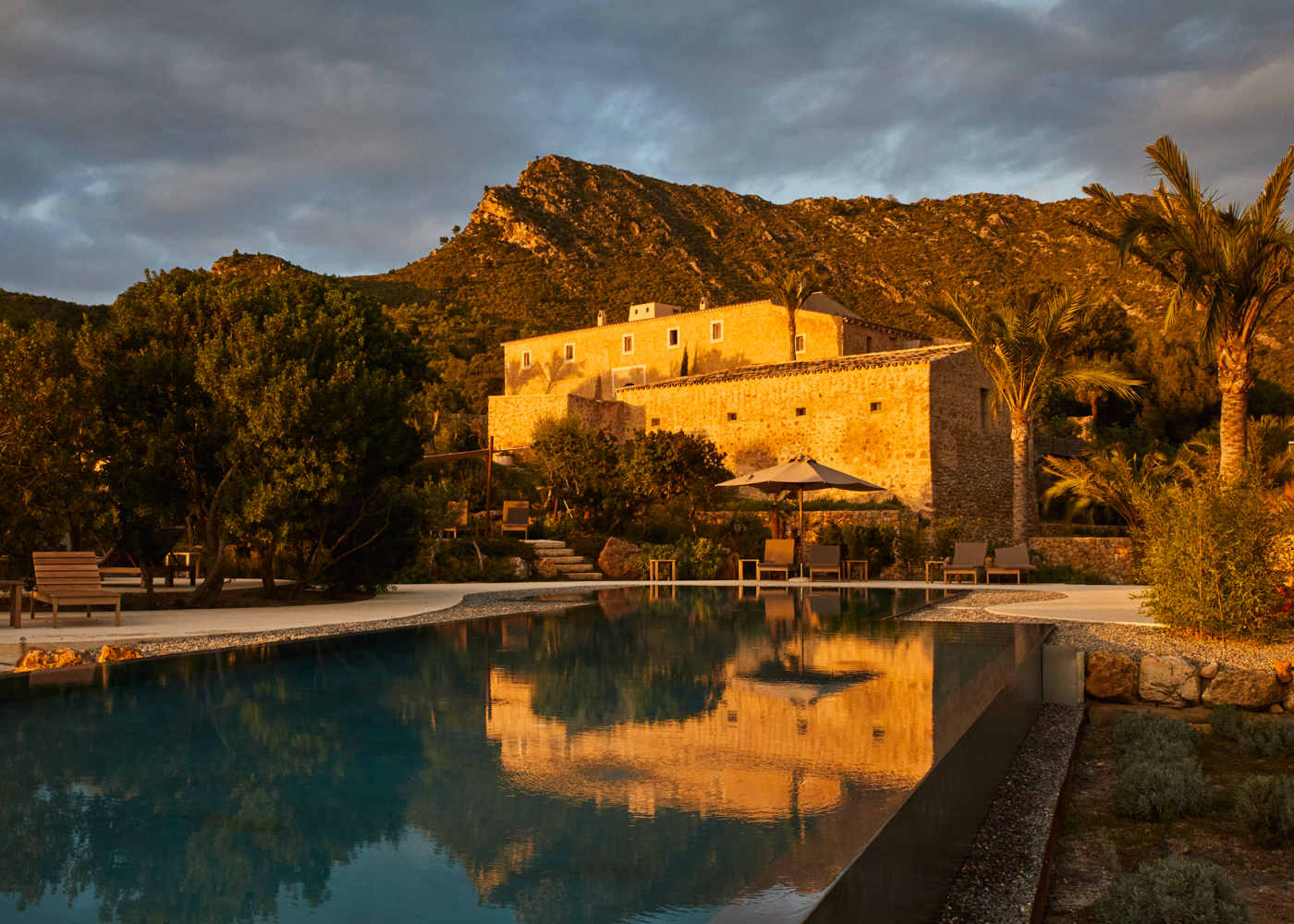 a pool with a building in the background