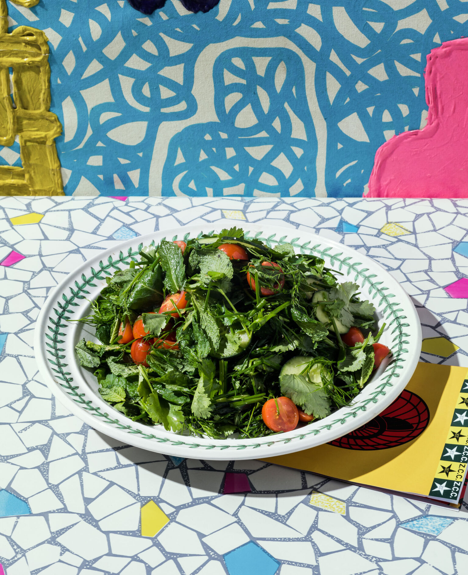 a bowl of salad on a table