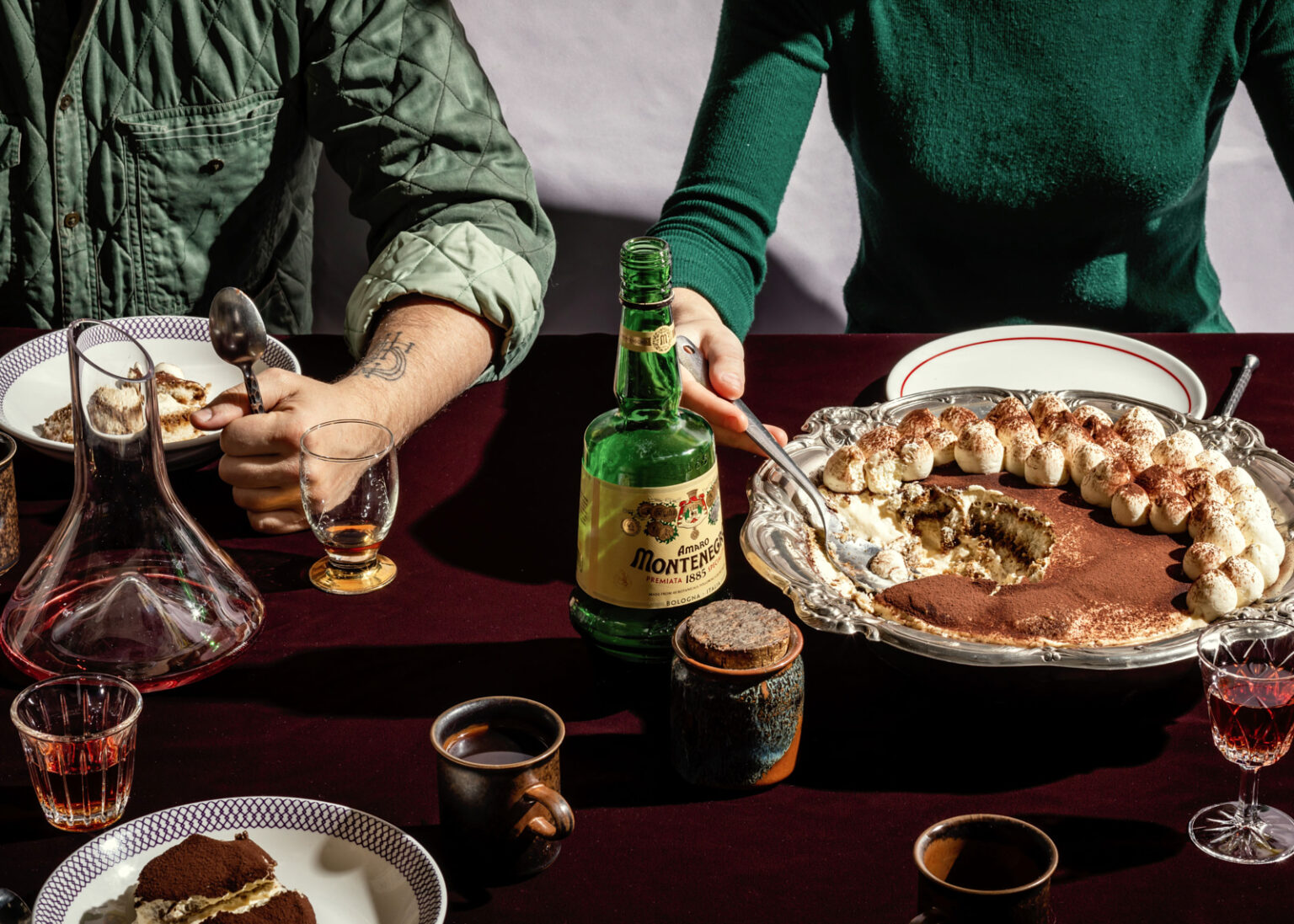 a person eating food at a table